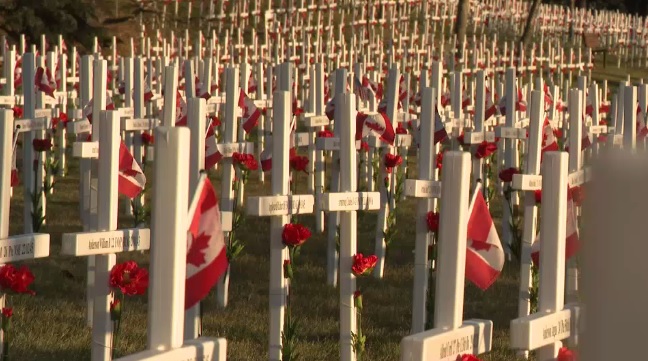 Remembrance day begins in Calgary with the sunset ceremony at the field of crosses.