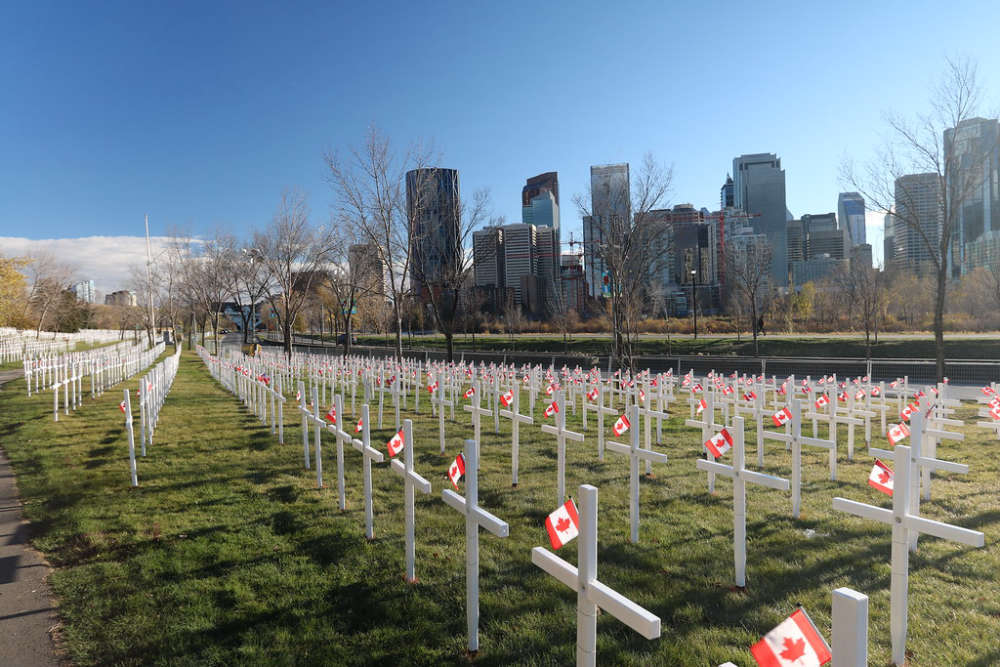 Calgary students place poppies at Field of Crosses
